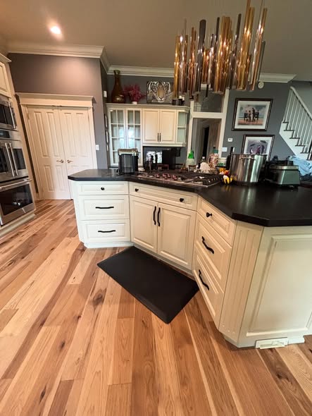 Cream cabinets with hand-finished detail